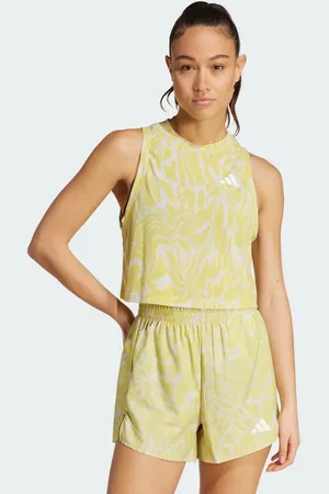 adidas Playera Sin Mangas Con Estampado Integral Train Essentials Beige - Mujer