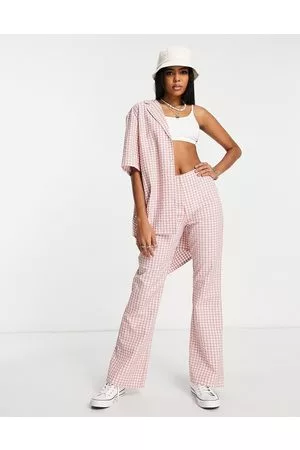 ASOS Mujer Leggings y treggings - Casual flare trousers in pink check co-ord