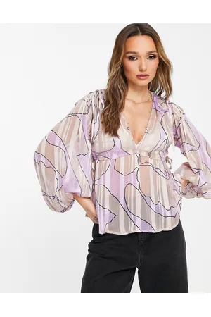 ASOS Volume long sleeve with tie detail and pelum hem in abstract swirl print