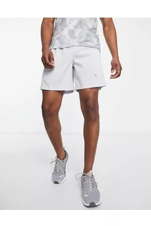 PUMA Hombre Shorts - Running woven 7in shorts in