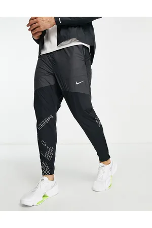 Joggers azules de tejido Phenom Elite de Nike Running, White