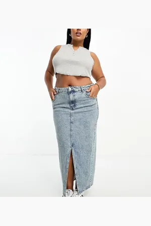 ASOS ASOS DESIGN Curve denim midi skirt with split hem in midwash