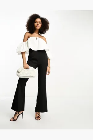 In The Style Bardot puff sleeve flared jumpsuit in black and white