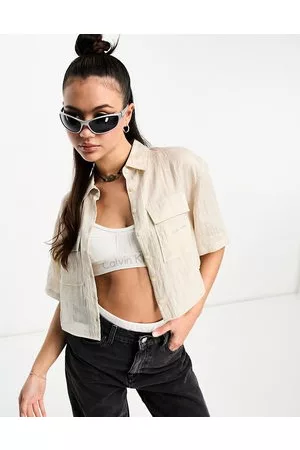 Calvin Klein Mujer Manga corta - Co-ord short sleeve button through top in beige