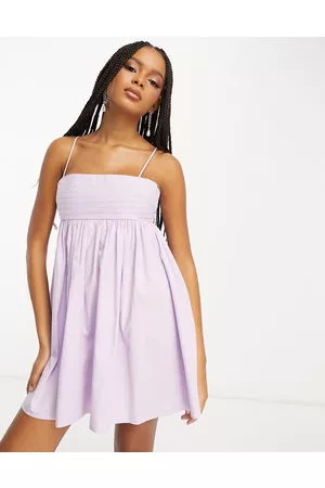 ASOS Mujer De playa - Cotton pleat bust babydoll mini sundress in lilac