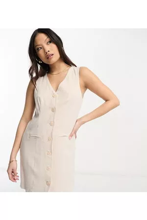 ASOS Mujer Chalecos - ASOS DESIGN Petite sleeveless button through waistcoat dress in natural