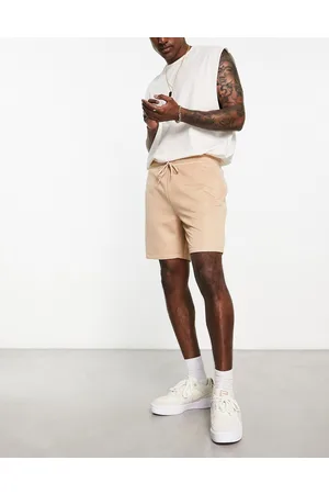 ASOS Slim shorts in beige quilted texture