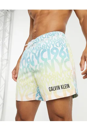 Calvin Klein Medium length swim shorts in typo print