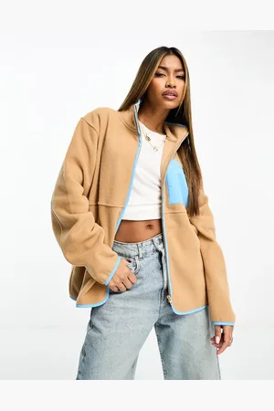 ASOS Zip through fleece with color pop nylon pocket detail in