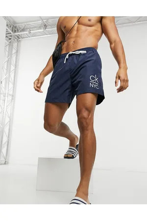 Calvin Klein Medium length swim shorts in dark
