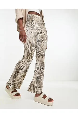 ASOS Plisse flare pants in mixed animal print