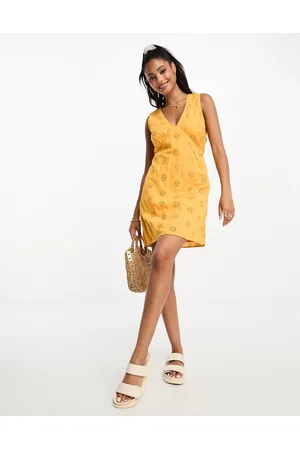 VERO MODA Eyelet mini dress with cross back in yellow