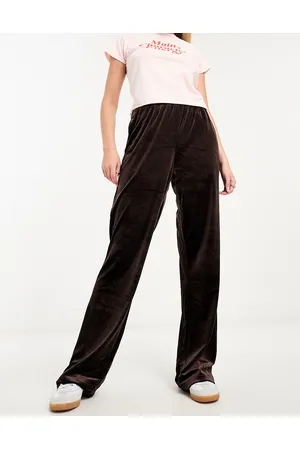 ASOS DESIGN Petite velour flare pant in ombre snake print