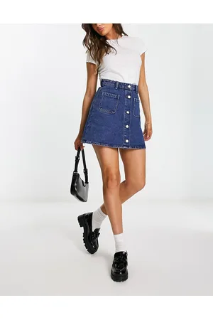 Monki Denim button through mini skirt in mid- wash