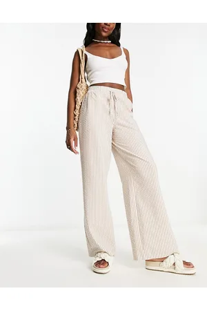 ASOS DESIGN Petite velour flare pant in ombre snake print