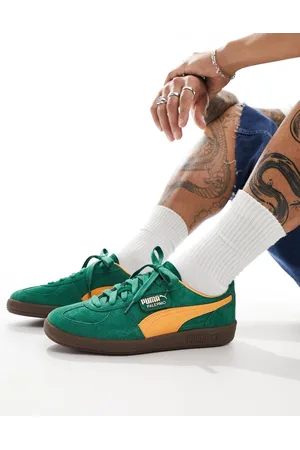 PUMA Palermo sneakers in and orange