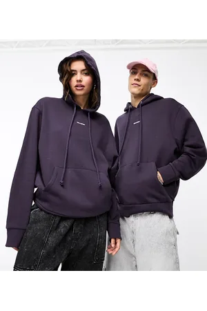 COLLUSION Unisex central logo hoodie in washed