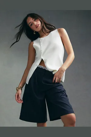 ASOS Knit asymmetric button front vest with split in cream