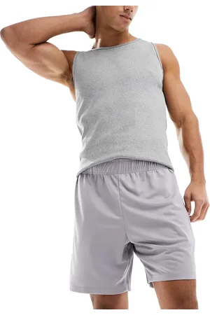 ASOS Longline 10 inch shorts in mesh fabric in lilac