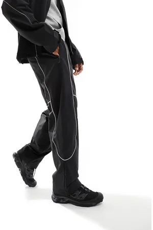 The North Face Tek piping wind pants in