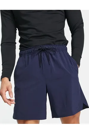 Nike Training Dri-FIT Unlimited ultra-light woven 7inch shorts in navy
