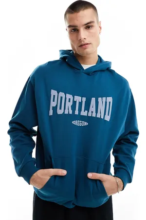 ASOS Oversized hoodie in dark with puff print city text