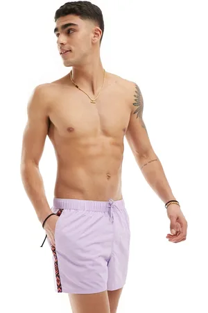 ASOS Swim shorts in short length with pattern side stripe in