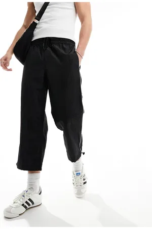 ASOS Wide awkward length nylon pants with toggle detail in