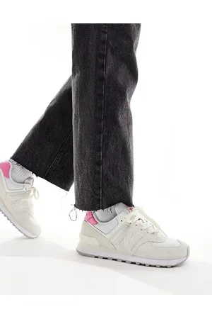 New Balance 574 sneakers in cream with pink details