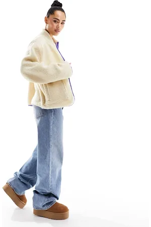 Pieces® Teddy fleece in cream with blue contrast binding