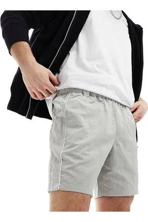 ASOS Slim nylon shorts with piping detail in stone