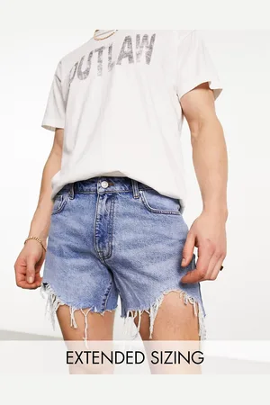 ASOS Shorter length denim shorts in light wash with rip detail and raw hem