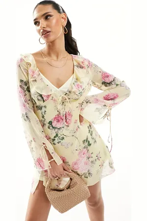 Love Triangle Mini dress with ruffle detail in floral