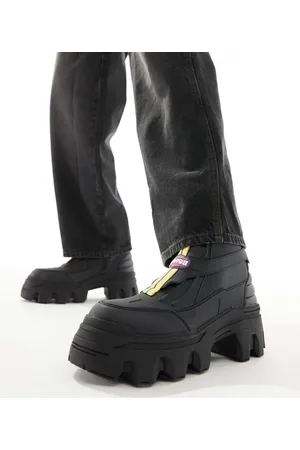 ASOS Chunky boots in black with motocross detailing