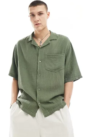 COLLUSION Textured oversized camp collar short sleeve shirt with raw seam detail in khaki