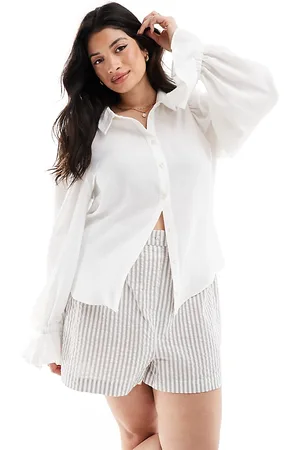 ASOS ASOS DESIGN Curve volume sleeved soft shirt with ruffle cuff in ivory