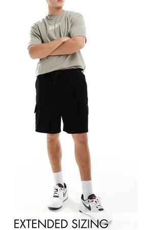 ASOS Oversized ribbed velour shorts in with cargo pockets