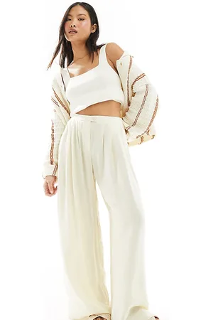 Stradivarius Petite fluid pleat front pants in buttermilk