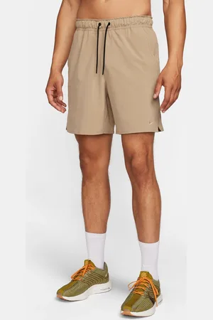 Nike Training Dri-FIT Unlimited woven 7inch shorts in beige