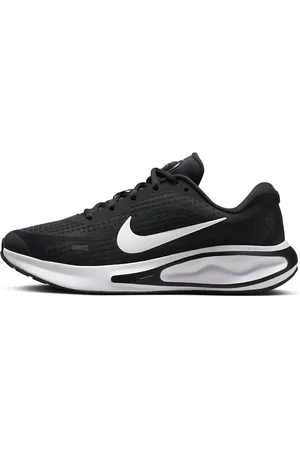 Nike Journey Run sneakers in and white