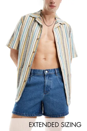 ASOS Pleated mid length denim shorts in light wash