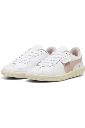 PUMA Palermo sneakers in with pink detail