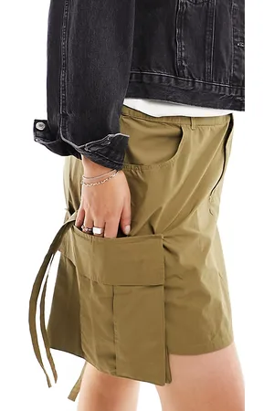COLLUSION Plus festival utility mini skirt with drop pocket and tab detail in khaki