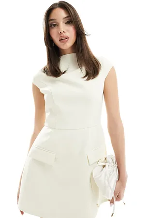 HEIRESS BEVERLY HILLS Exclusive premium structured cap sleeve pocket detail mini dress in cream