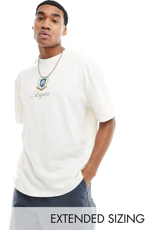 ASOS Oversized T-shirt in off with varsity chest print