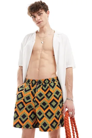 Hunky Trunks Geo stripe swim shorts in and orange
