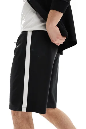 ASOS Contrast side stripe active jersey shorts in & white