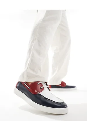 ASOS Lace up boat shoes in navy suede with red and white details