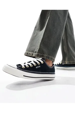 Converse Chuck Taylor All Star Ox sneakers with crafted stitching in and white