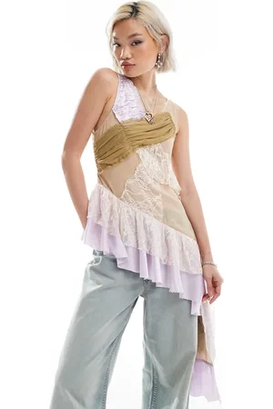 Reclaimed Limited edition longline asymmetric hem top in spliced fabric